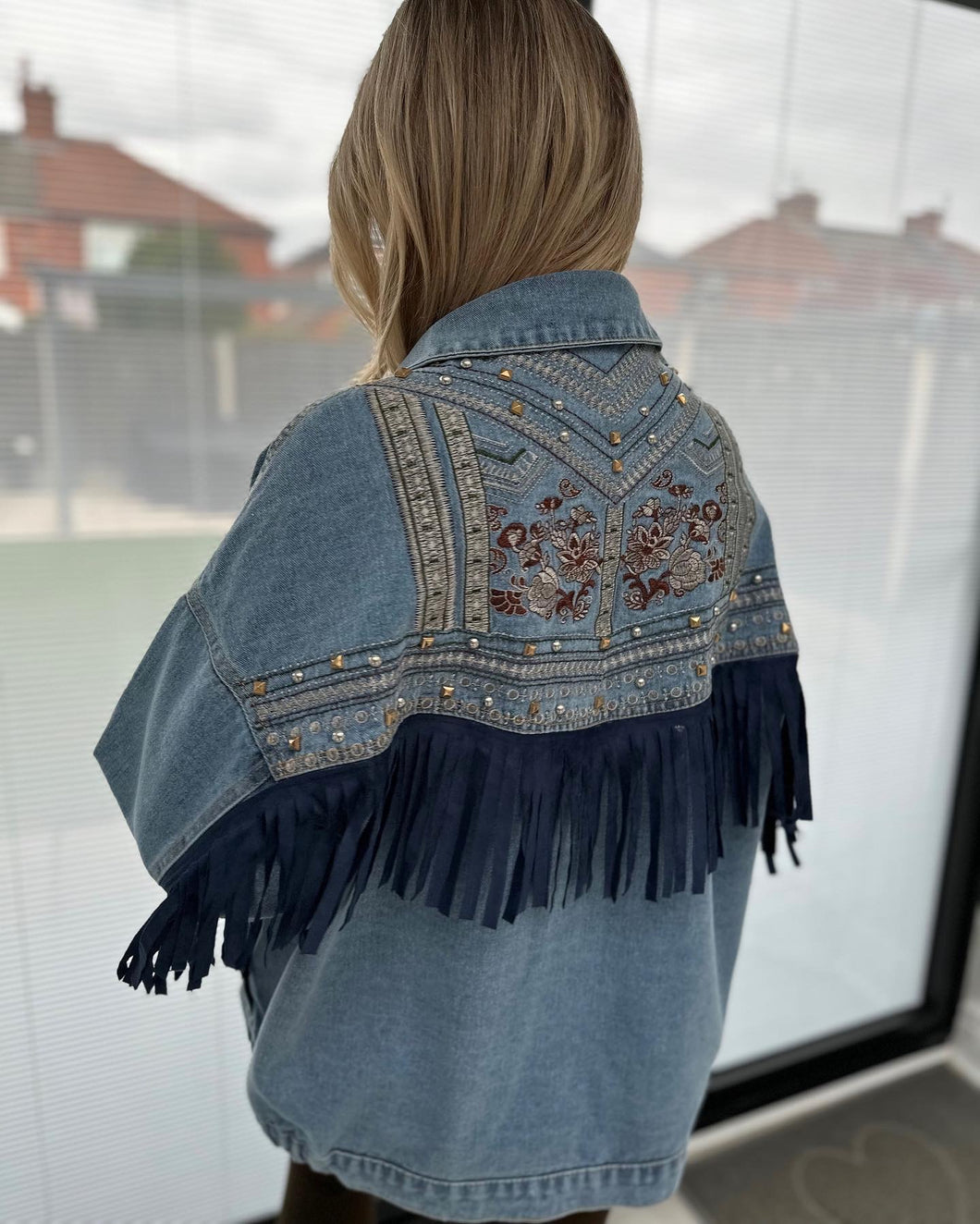Embroidered fringe denim jacket